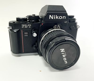 מצלמה NIKON T 8512960 מצב כחדש עם עדשת f/2.8 24mm T 8512960עם פילטר