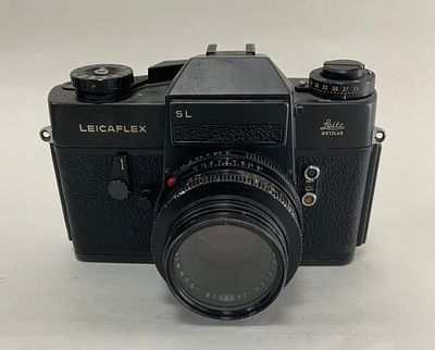 מצלמה LEICAFLEX LEITZ WETZLER SL f/2 50mm עם פילטר COZO UV 43.5mm