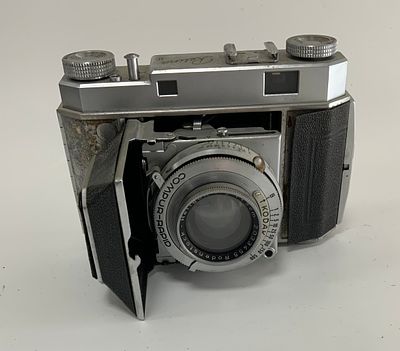 מצלמה RETINA II KODAK 50mm RODENSTOCK HELIGON f/2 מצב משומש סביר עם מעט נזק של הפנלים