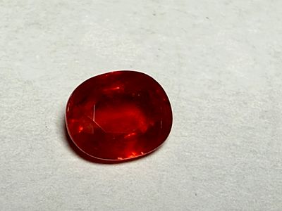 אודם-רובי טבעי NATURL RUBY-OVAL SHAPE 1.20 CT - 6.9X5.6X3 MM-צבע אדום עם מעט כתום - עם ברק טוב 
