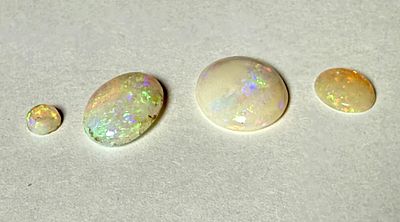 ארבעה אבני אופל טבעי - 0.25-0.60-2.25-2.45 CT - עם ניצנוצי צבעים יפים - NATURAL OPAL - משקל 