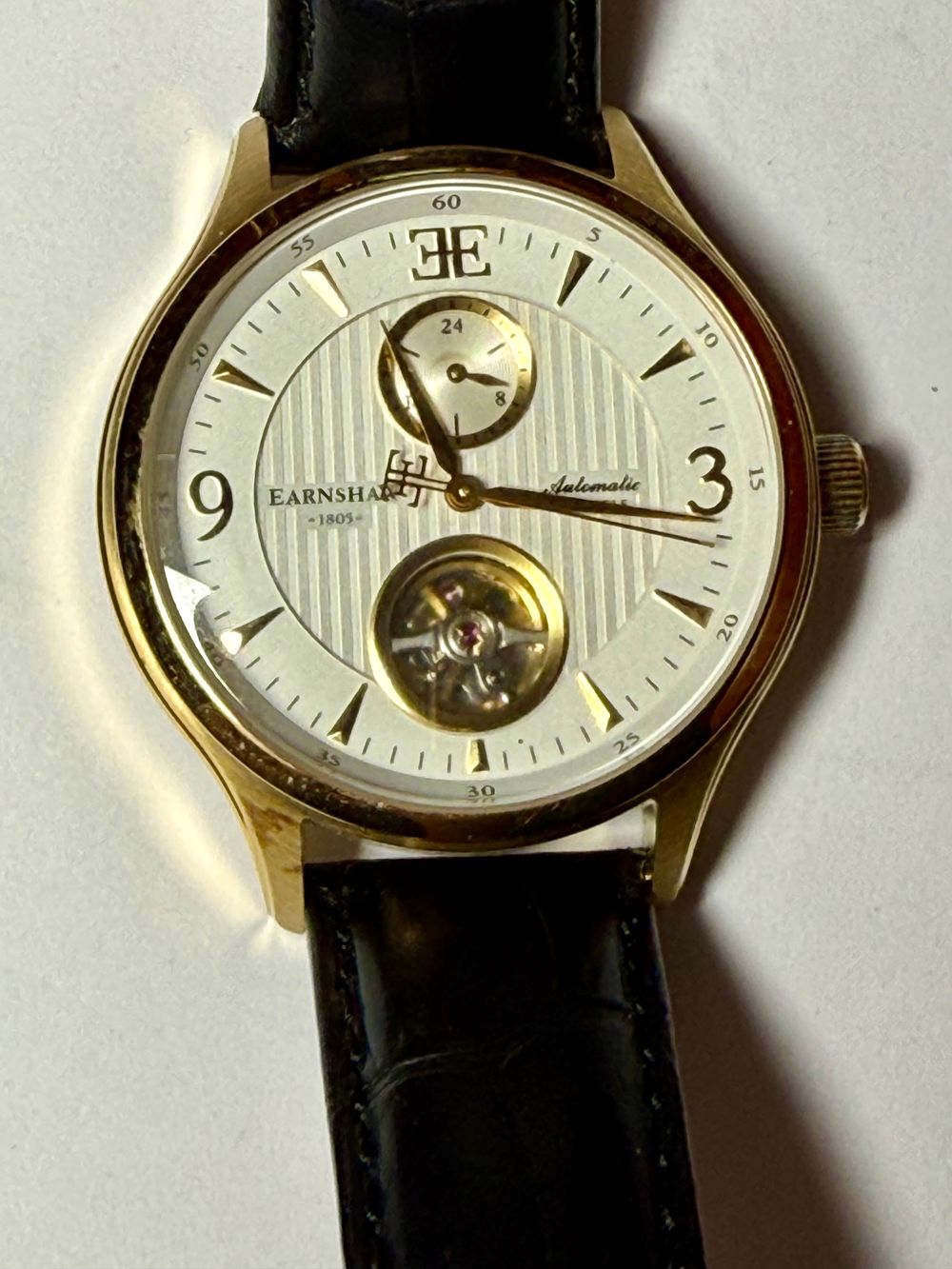 THOMAS EARNSHAW שעון יד AUTOMATIC עם שעון קטן 24 שעות - מוזהב גב חצי שקוף-42 מ''מ תקין עובד 