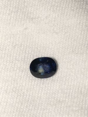 אבן חן ספיר כחול ירקרק אפריקאי טבעי בליטוש אובלי לא משובץ במשקל 1.40 CT