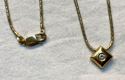 שרשרש ותליון זהב 14 קרט 7,4 גרם עם יהלום 0.15 CT נקי לבן מעולה אורך 42 ס"מ 
תליון 1 ס"מ