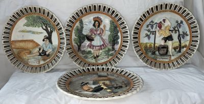 אוסף 4 צלחות קרמיקה איטלקית מפוסלות תבליטים - ארבע העונות 
קוטר כל צלחת 27 ס״מ