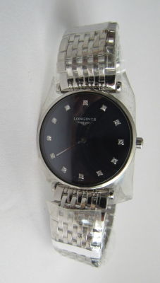שעון יד לאישה LONGINES LE GRANDE CLASSIQUE לוח כחול משובץ 12 יהלומים חדש לא נענד עם הפלסטיק 