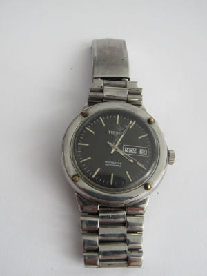 שעון יד TISSOT NAVIGATOR אוטומטי עם רוצעה מקורית תאריכון ויום DAY DATE במצב עבודה 40 מ''מ