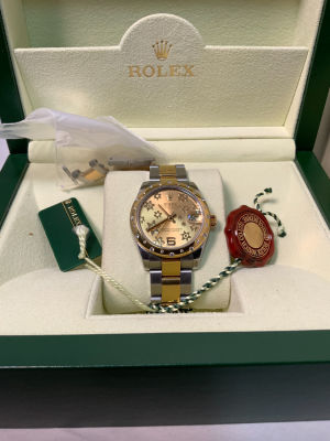Rolex Lady-Datejust 2015 קוטר 31 מ"מ זהב צהוב ופלדה שמפניה טוטון עם מוטיב פרחוני בלוח נמצא במצב 