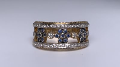 טבעת זהב 14K משובץ 52 יהלומים ועוד 21 ספירים כחולים משקל 5.4 גרם מידה: 7US