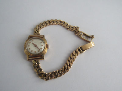 שעון זהב DOXA 14K JUBILE 75 מנגנון מכני עובד דרוש ניקוי קוטר 20 מ''מ משקל כולל מנגנון 23.5 גרם 