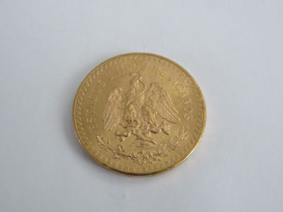 מטבע זהב 50 PESOS מקסיקו -37.5 גרם זהב טהור -37 מ"מ קוטר-משקל המטבע 41.7 גר 
( אין דיוק במידות 