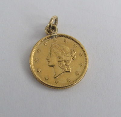 מטבע זהב 1 דולר עם הלחמה 12 מ"מ קוטר 
( אין דיוק במידות ומשקל בעשיריות מ"מ ועשיריות גרם )