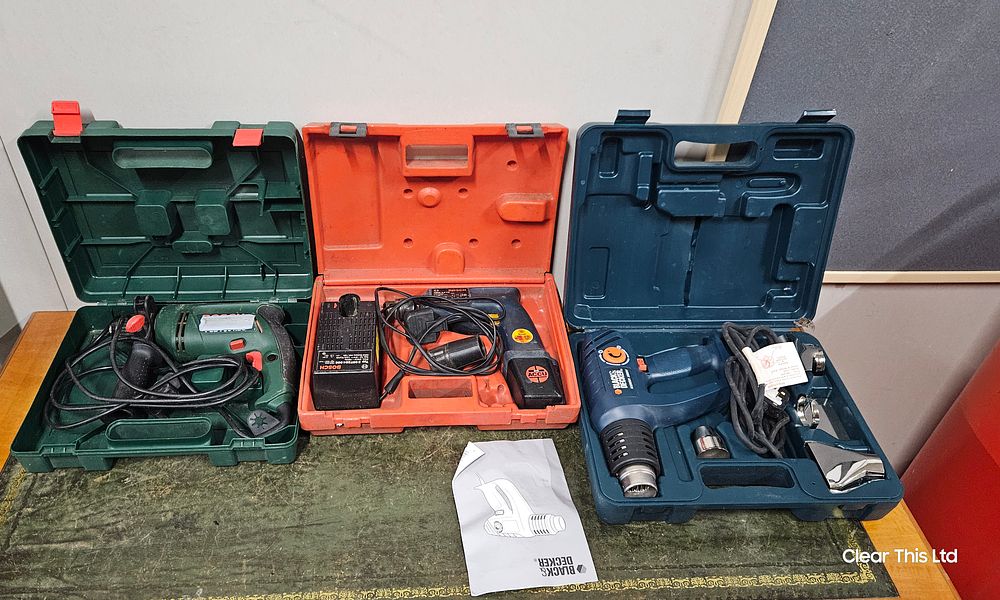 Lot 142: 2 bosch corded drills 1 black and decker heat gun