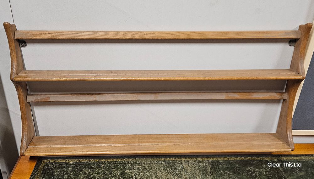 Lot 235: Ercol Blonde woodl plate rack