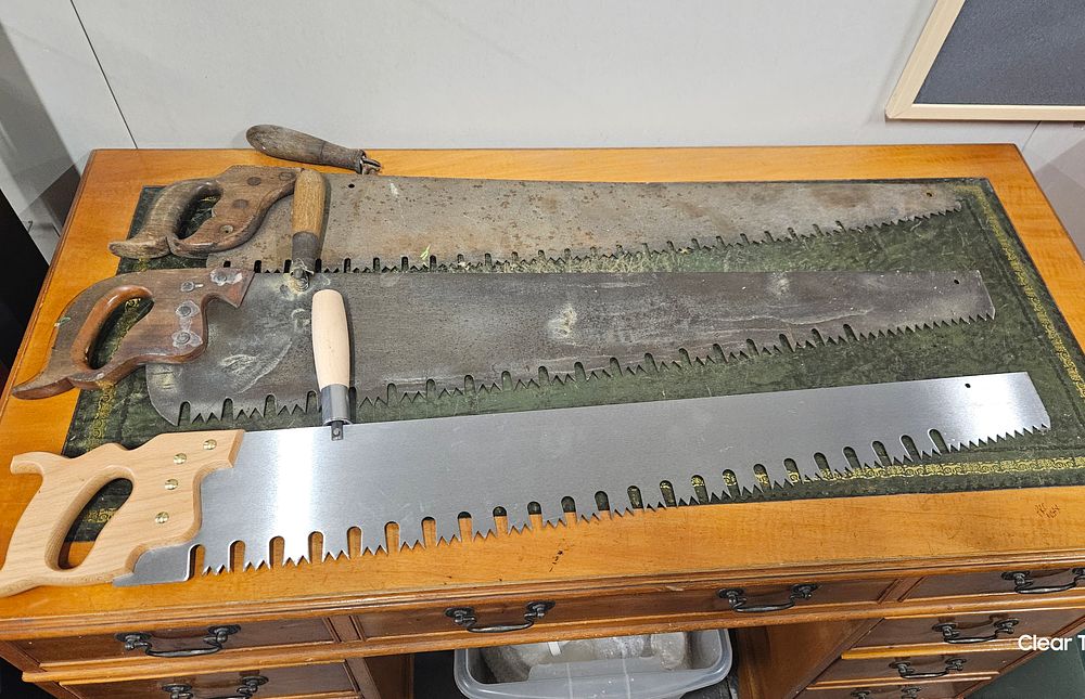 Lot 206: 2 Vintage handsaws and a modern one