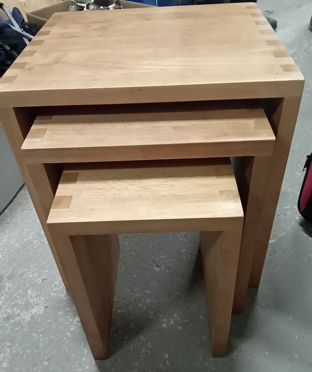 Lot 203: Nest of 3 solid wood side tables
