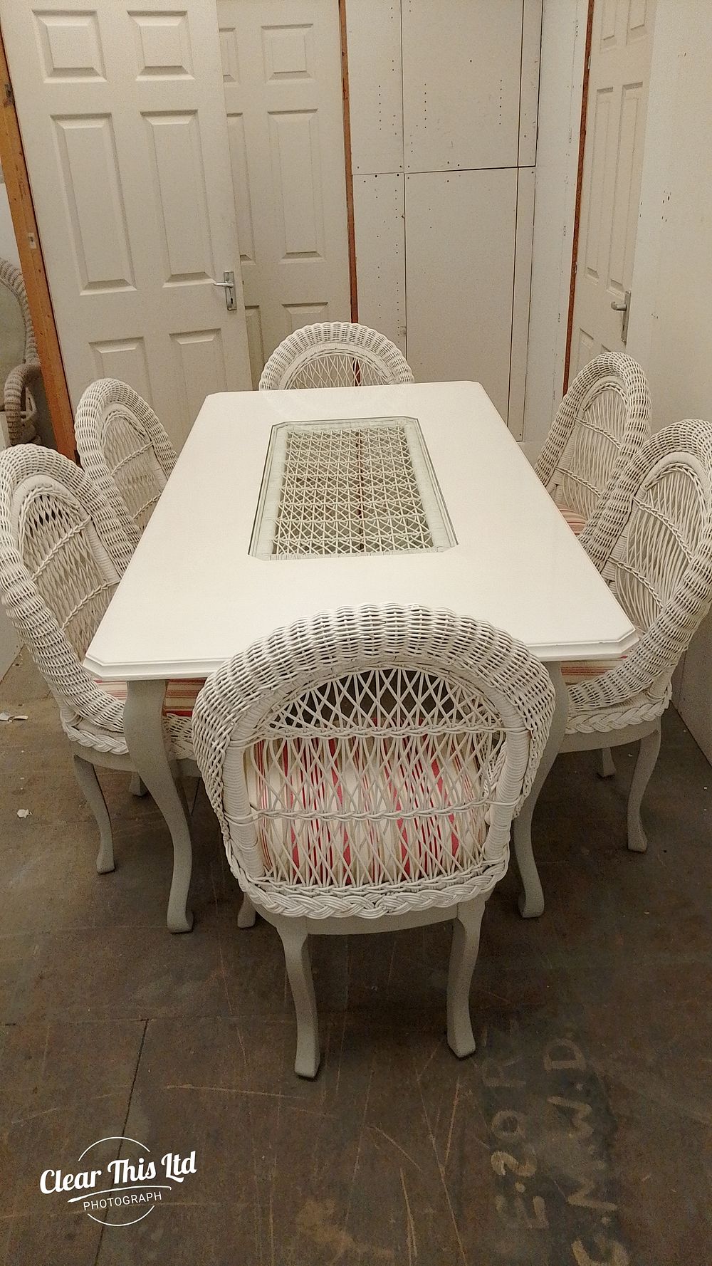 Lot 320: Dining table and 6 wicker chairs
