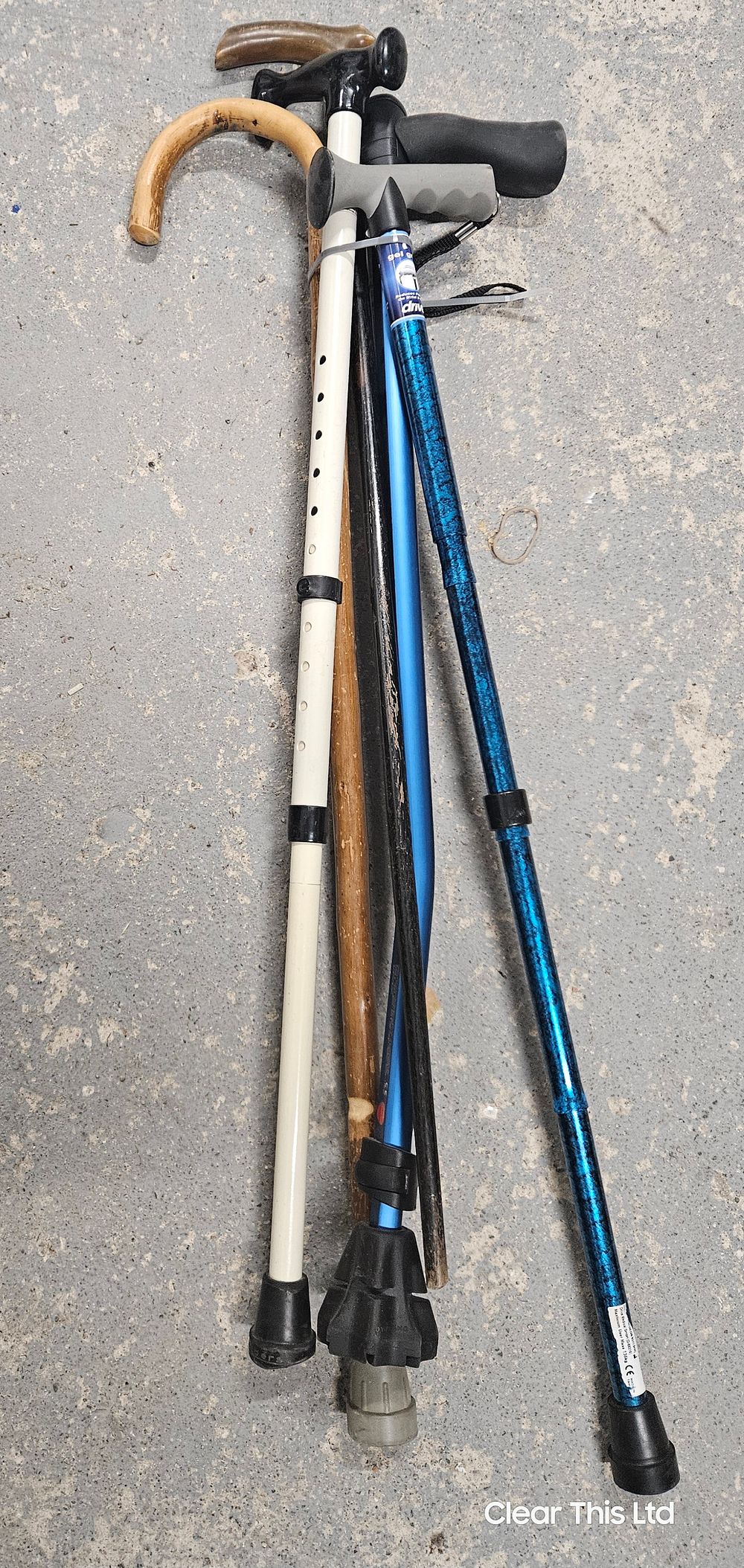 Lot 214: Five Walking Sticks