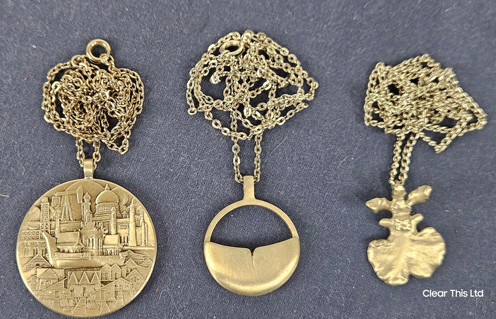 Lot 110: Three Selangor Pendants on Chains