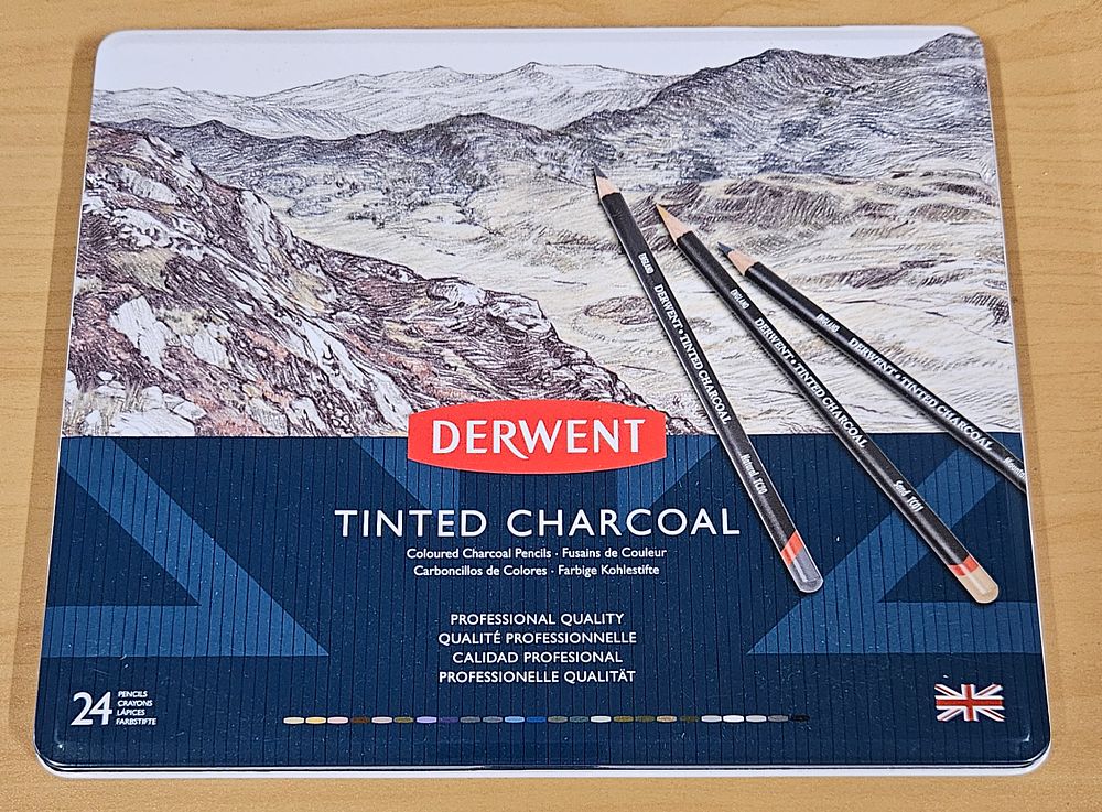 Lot 269: New Tin of 24 Derwent Tinted Charcoal Pencils.