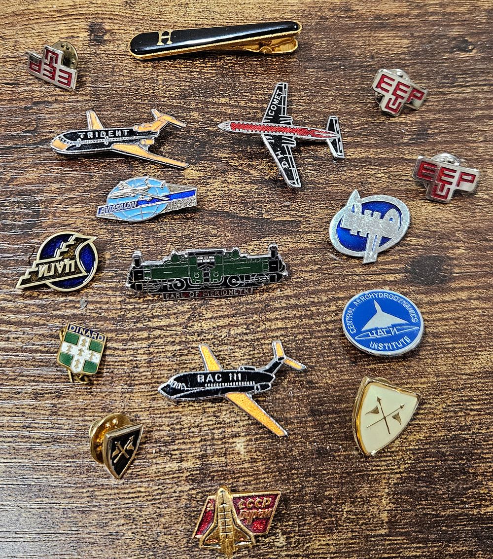 Lot 67: Lot of Pin Badges and a Tie Clip