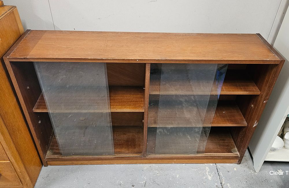 Lot 18: Double Book Case With Glass Sliding Doors