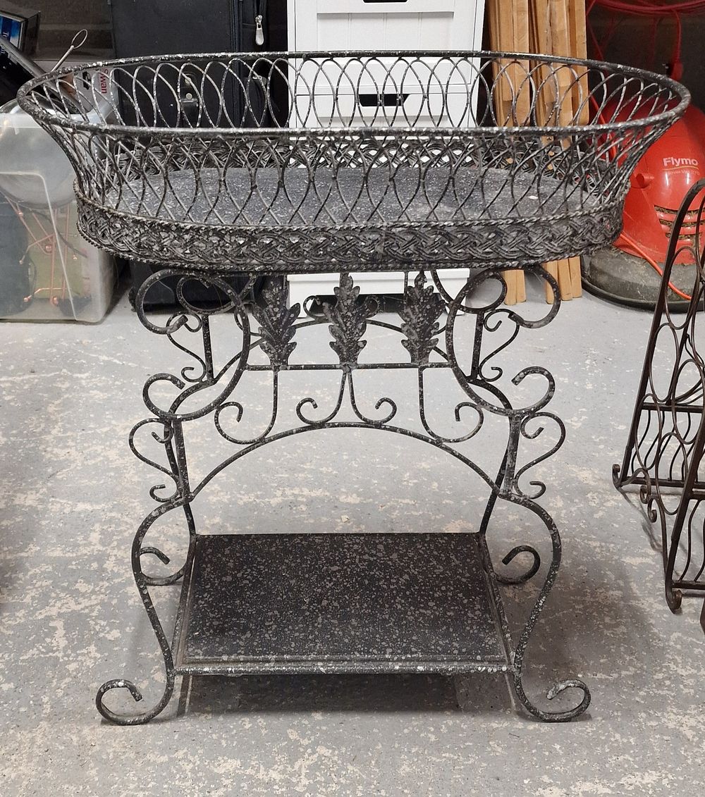 Lot 297: Wrought Iron Plant Stand 25" Tall 22"Wide