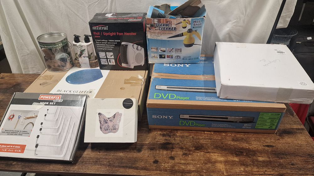 Lot 312: Selection of New And Boxed Items To Include Steam cleaner, Toilet Seat and Dvd Player