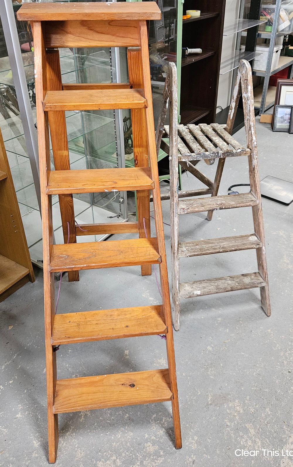 Lot 218: Two Sets of Wooden Stepladders.