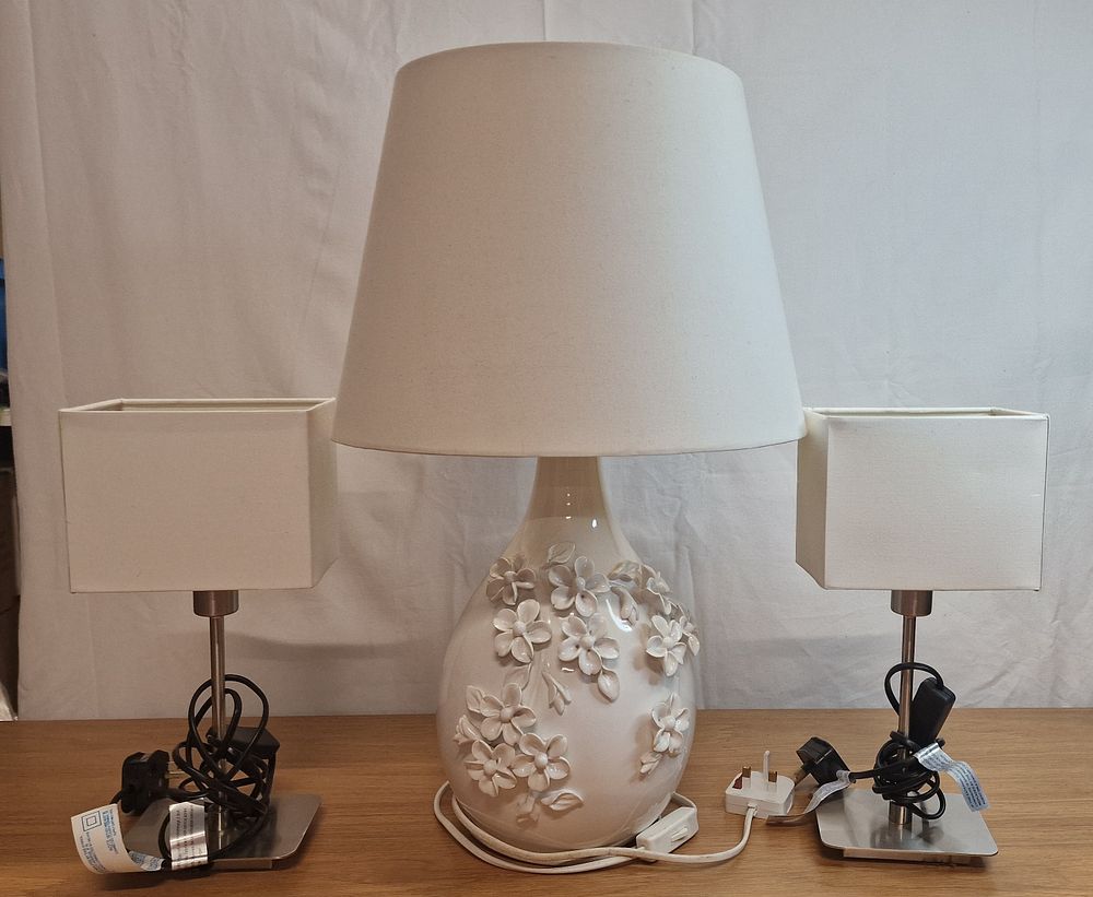 Lot 148: Three White Lamps