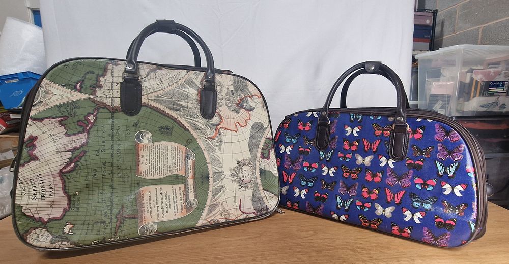 Lot 228: Two Luggage Bags With Wheels