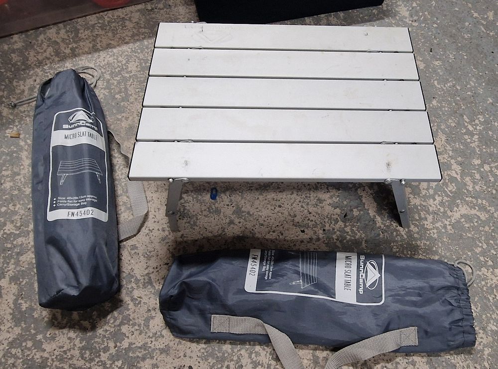 Lot 252: Pair Of SunnCamp Micro Slat Tables