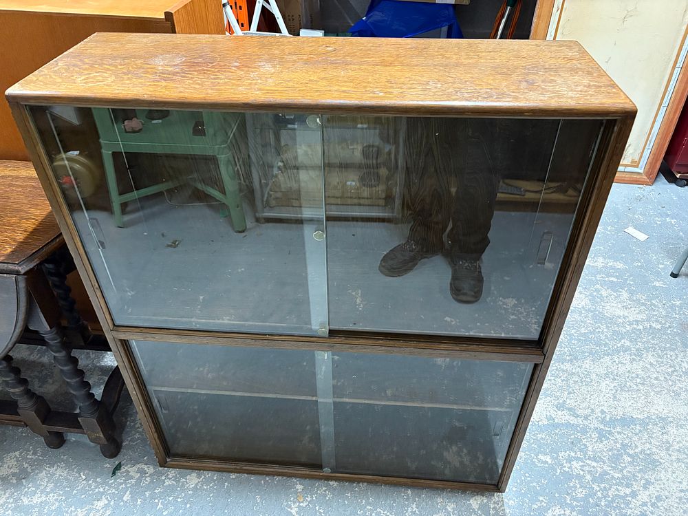Lot 163: Oak Book Case with Upper and Lower Sliding Glass Doors