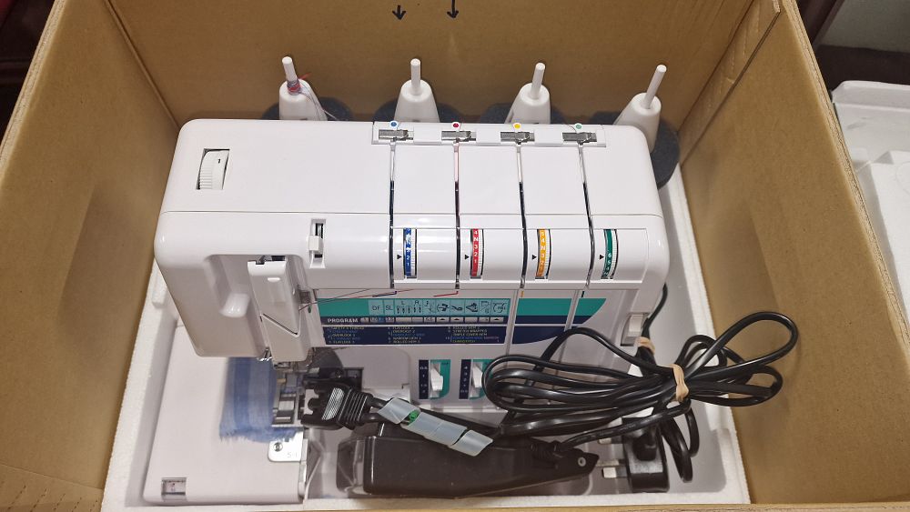 Lot 210: Elna Swiss Design Over locker Sewing Machine