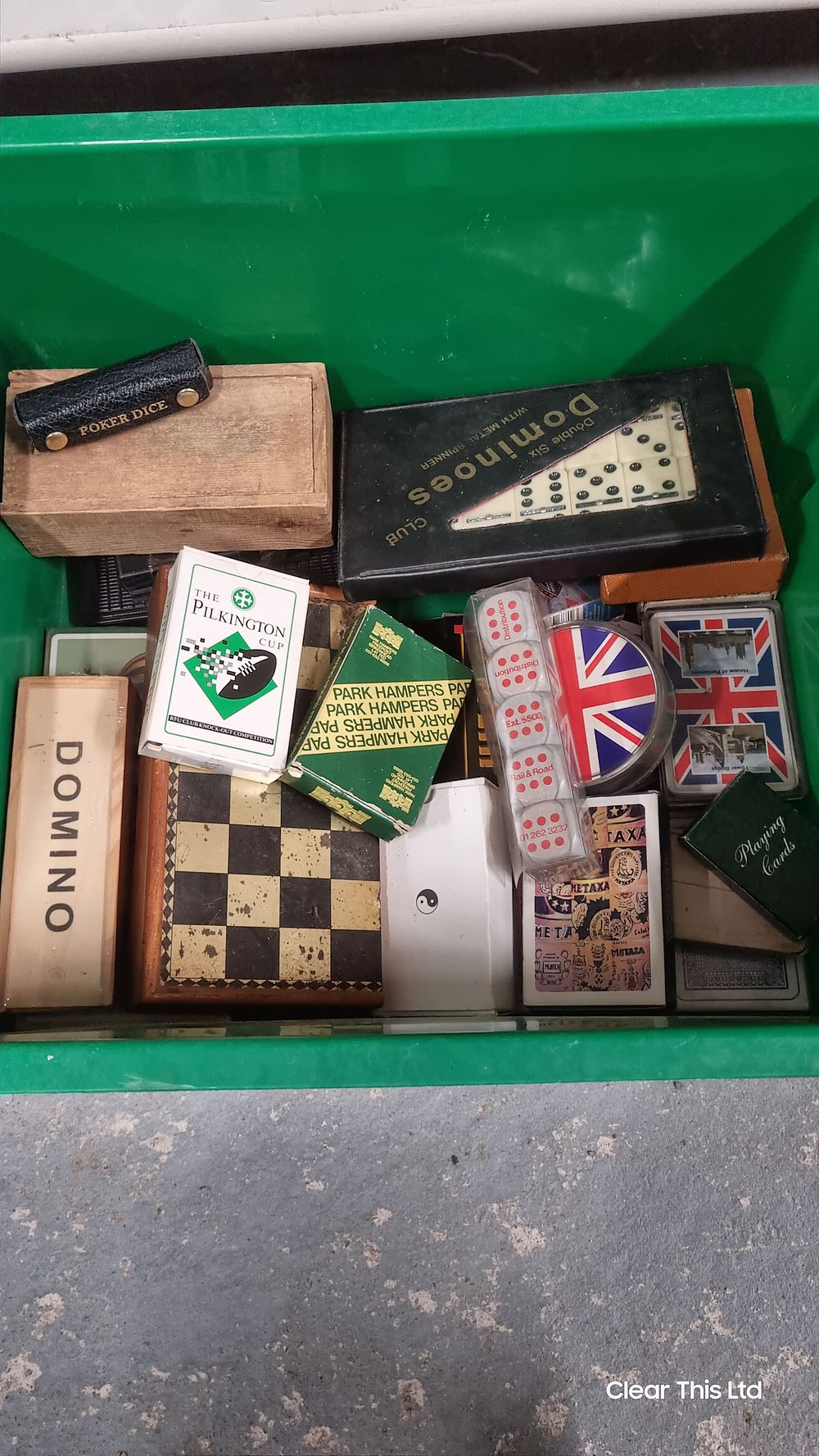 Lot 187: Box of assorted playing cards , dominoes etc .