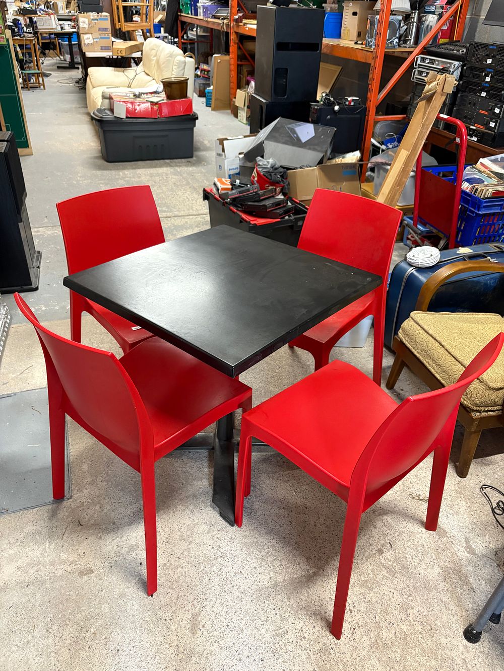 Lot 209: Indoor / Outdoor Table and 4 Red Chairs