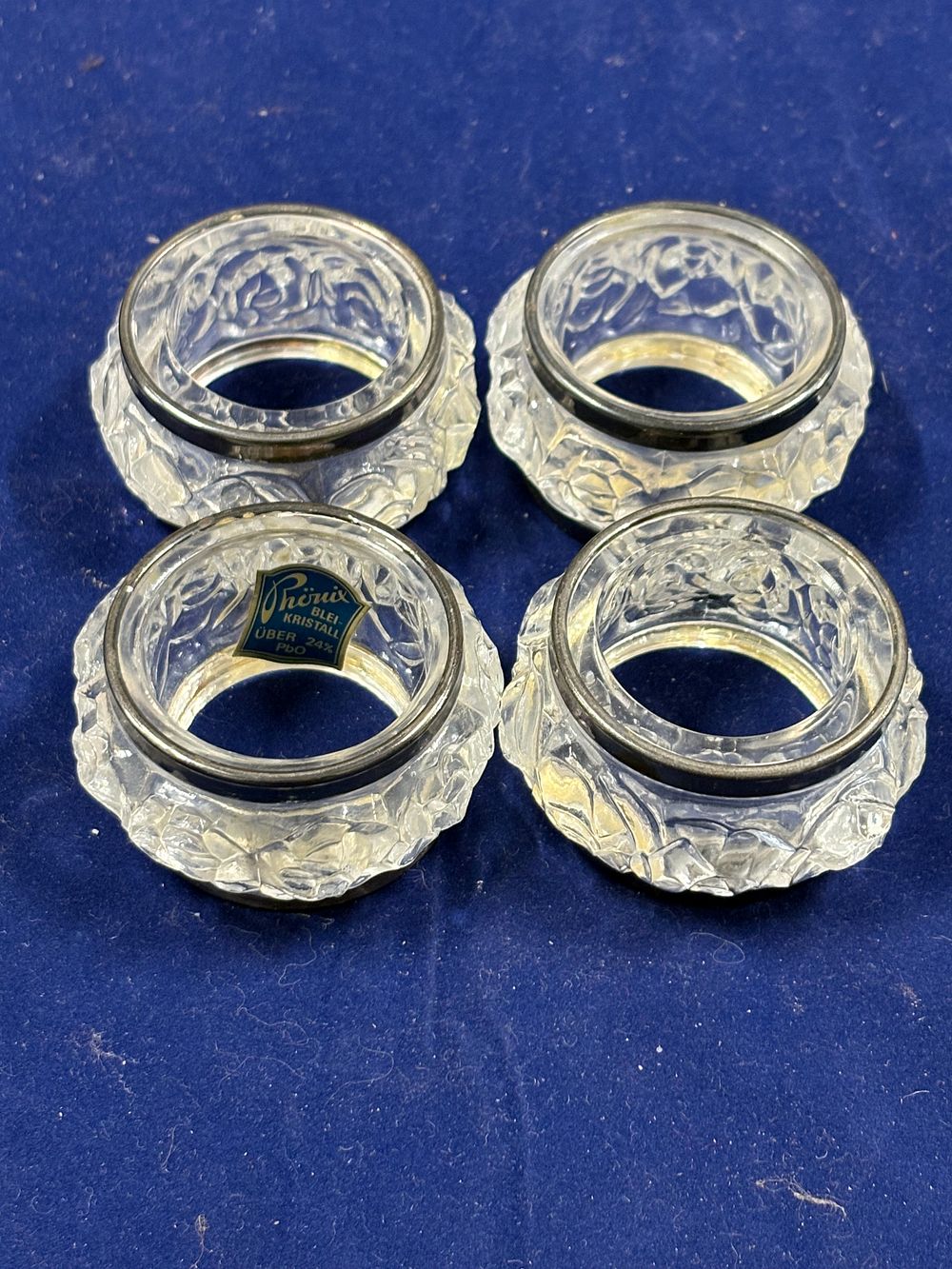 Lot 104: Set of 4 Vintage Crystal Napkin Rings