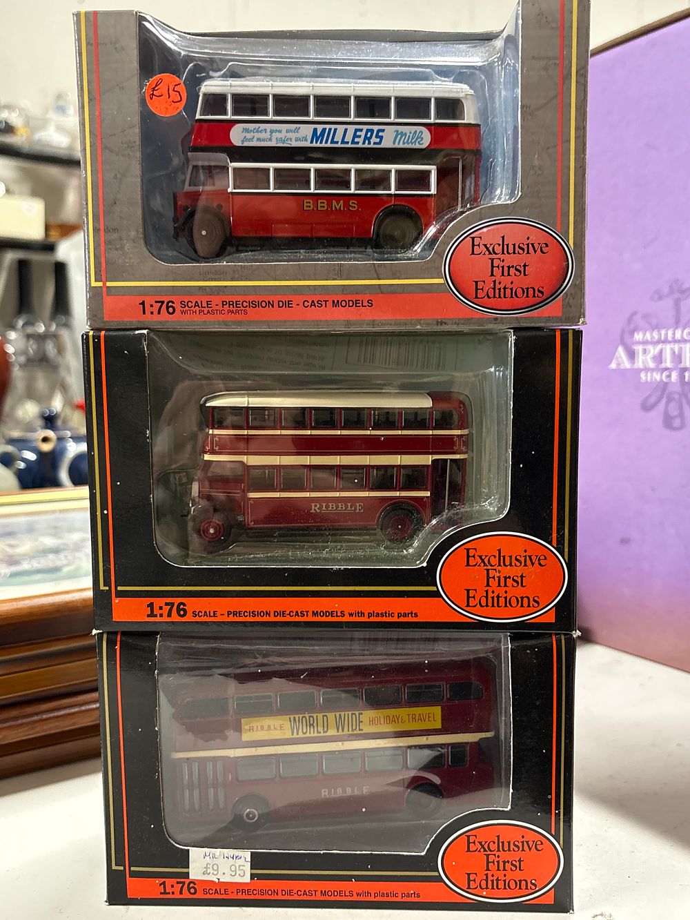Lot 215: Three gilbow die cast model busses