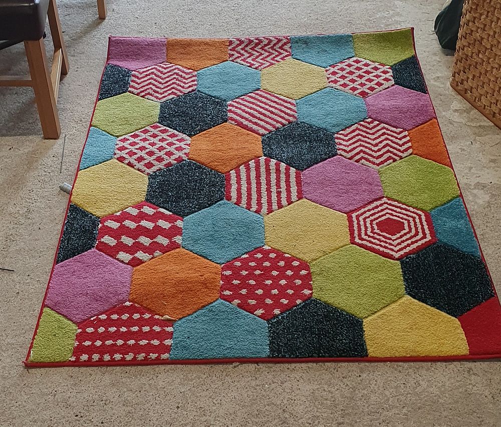 Lot 271: Colourful hexagonal patterned rug