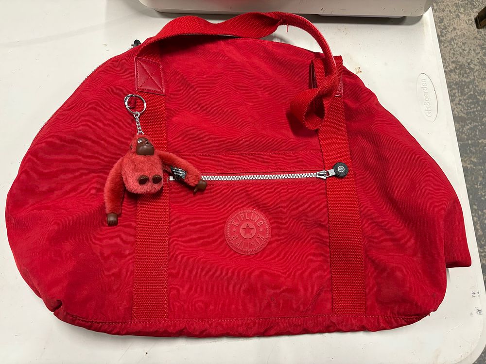 Lot 327: Large Red Kipling Bag