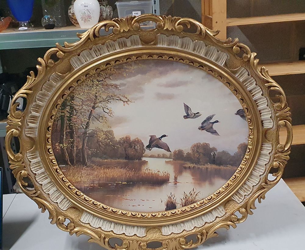 Lot 197: Decorative oval framed nature themed print