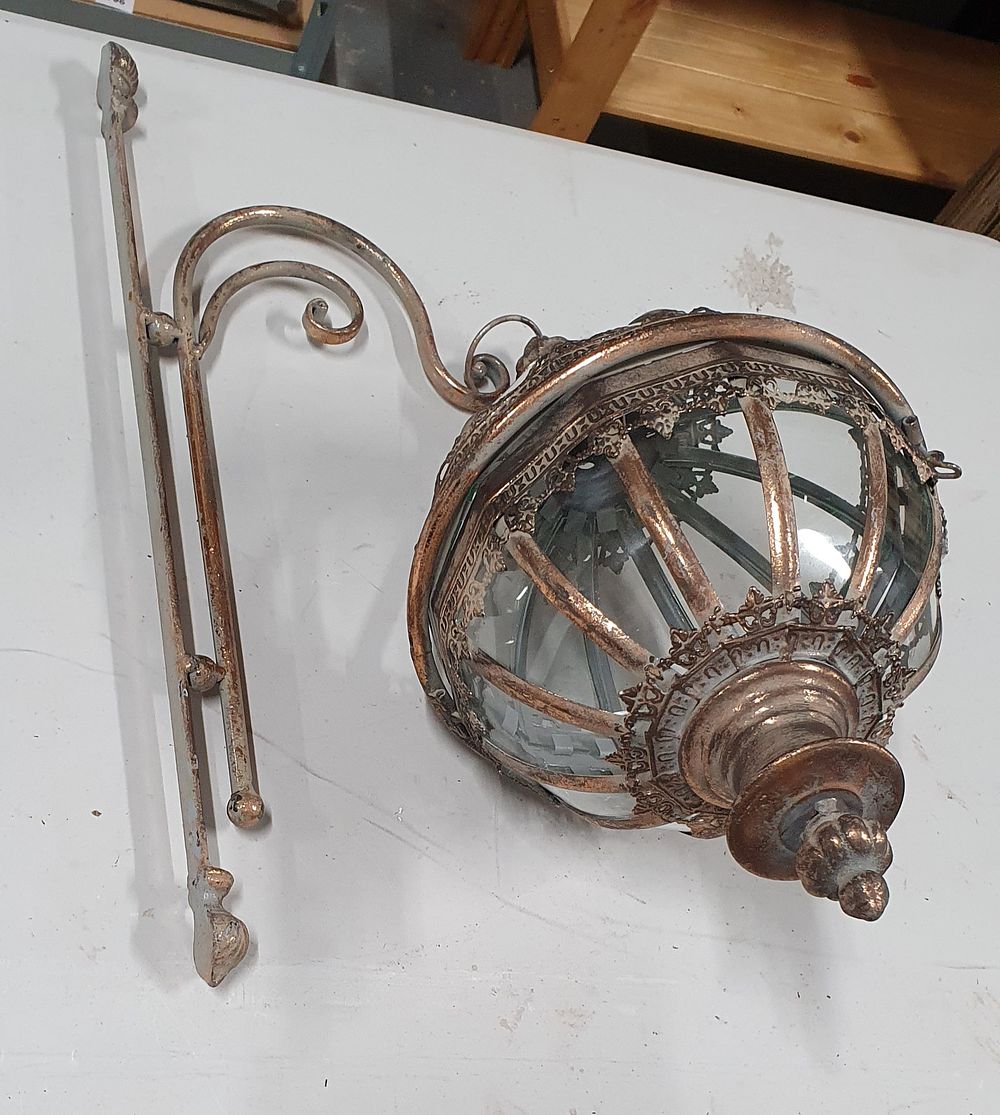 Lot 202: Regency style metal and glass candle lantern