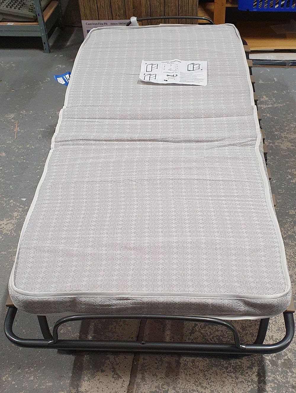 Lot 220: Folding guest bed on wheels