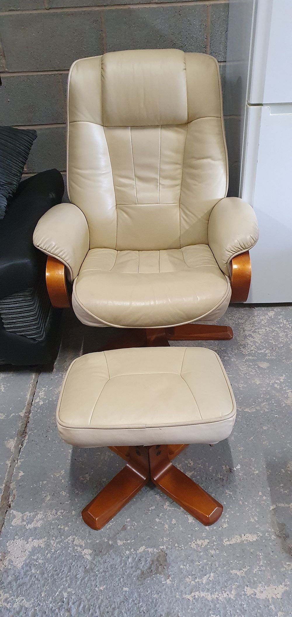 Lot 244: Nice leather swivel recliner and footstool