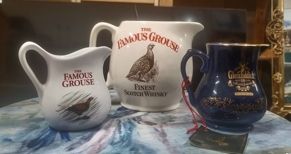 Lot 248: A lot of 3 Jugs, 2 The Famous Grouse and Glenfiddich