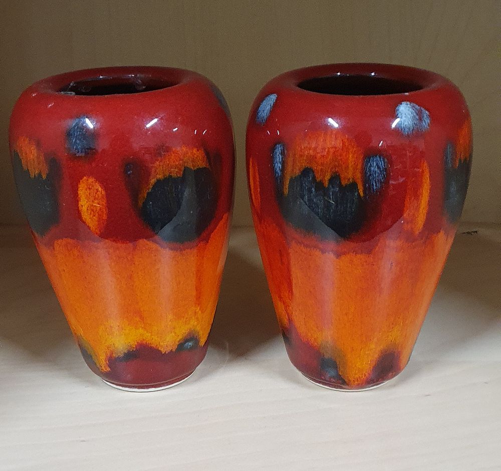 Lot 249: Poole pottery volcano pattern vases