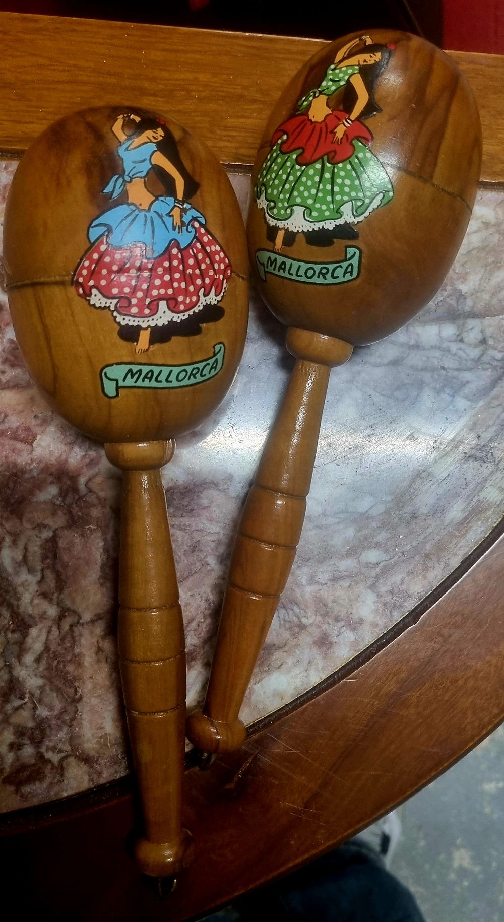 Lot 262: Wooden maracas with hand painted design