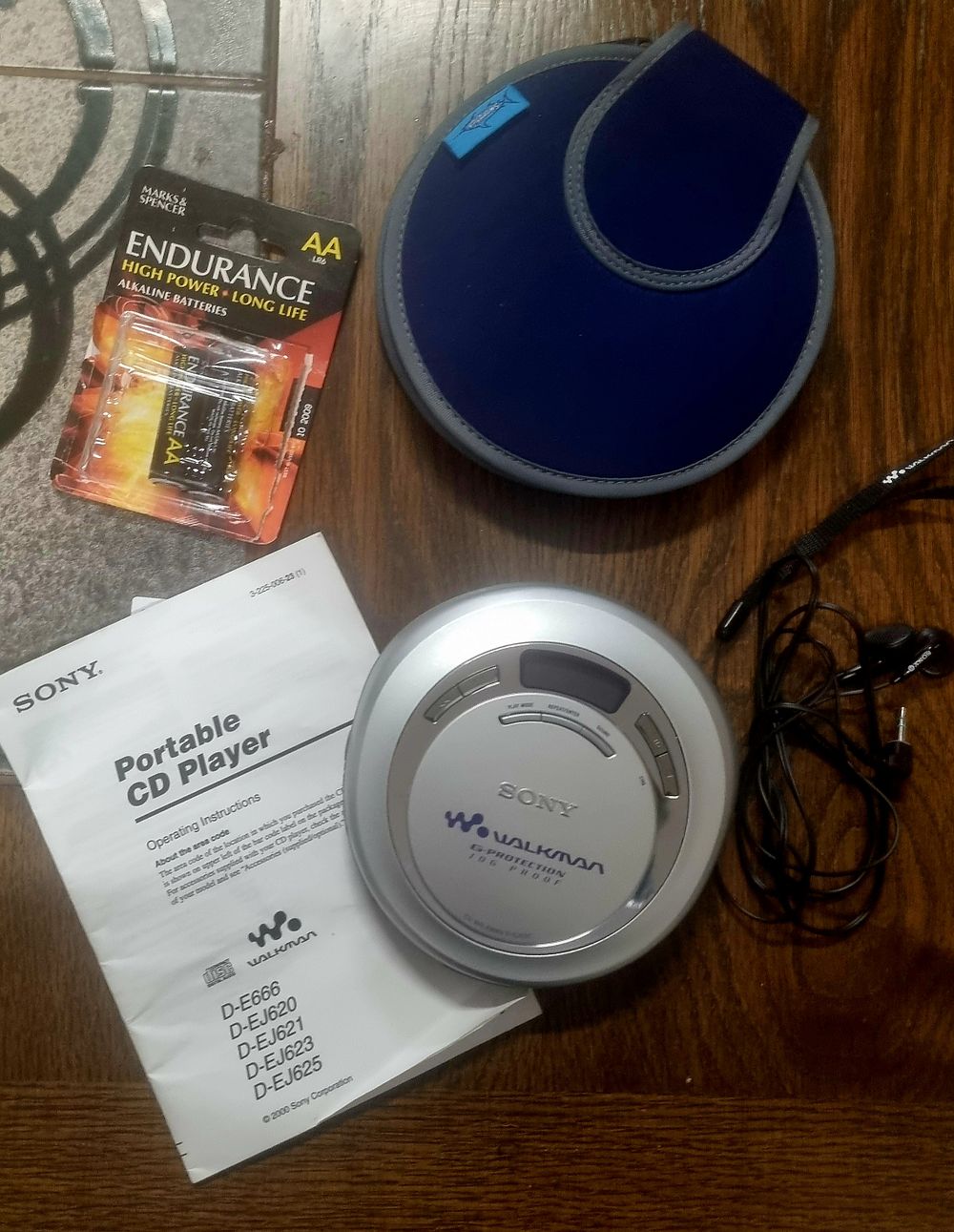 Lot 269:  SONY Portable CD player with earphones, extra batteries and a cd holder