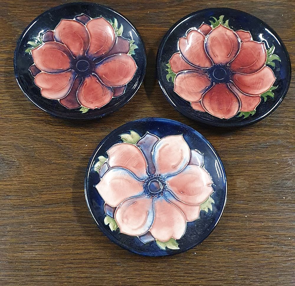 Lot 275: Moorcroft pin dishes x3