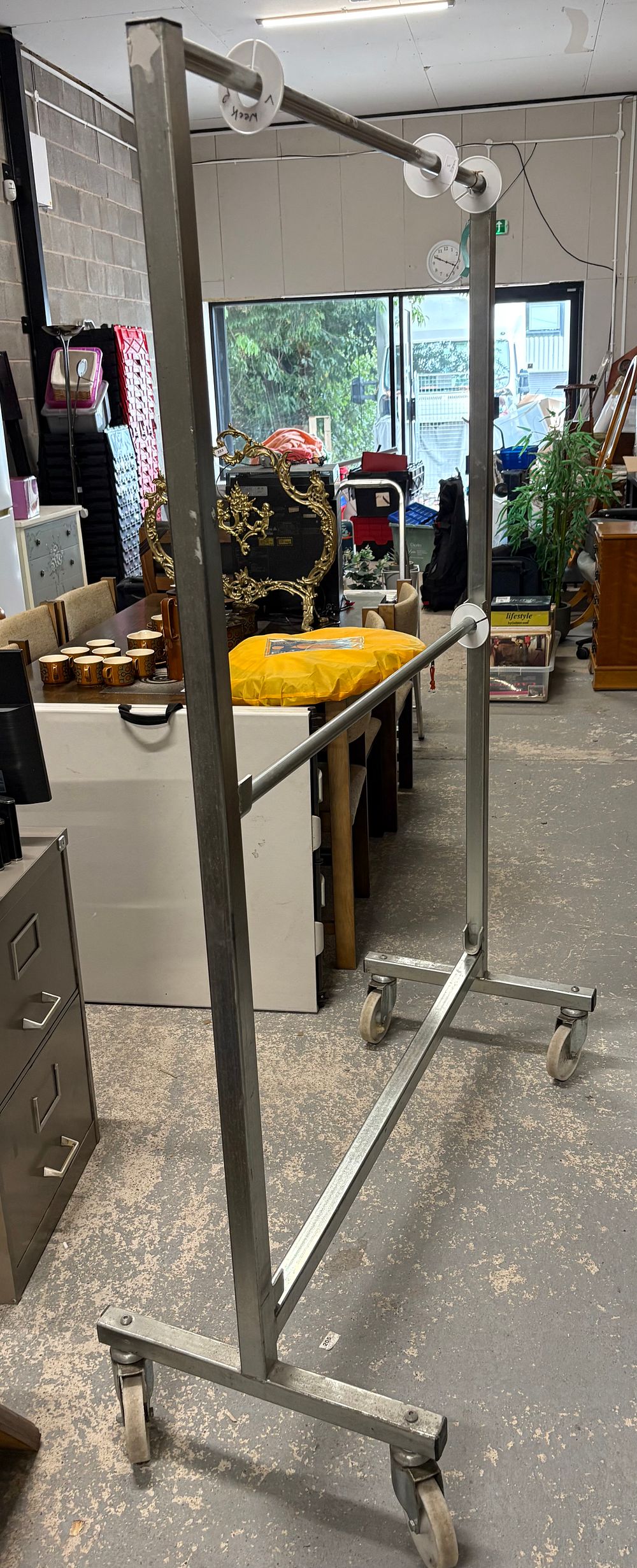 Lot 305: Commercial Clothes Rail on Big Wheels